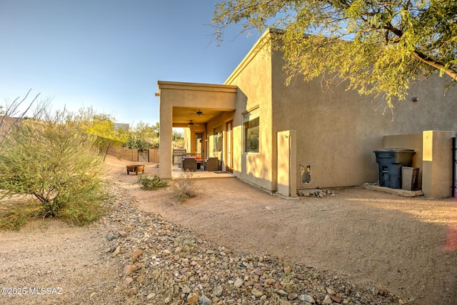 view of side of property featuring a patio