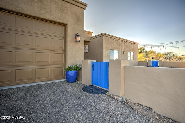 view of property exterior at dusk