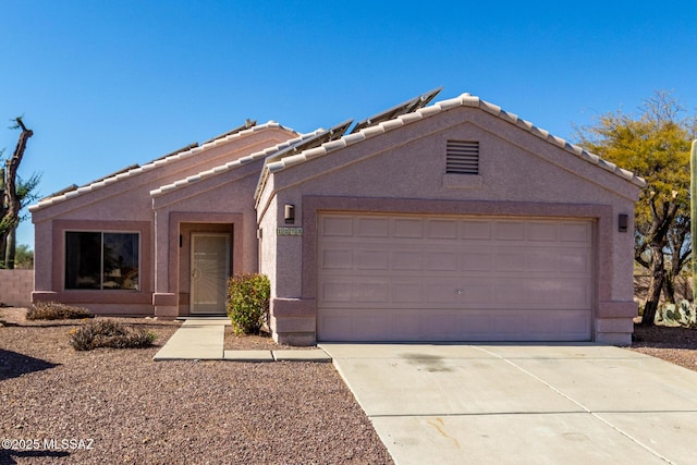 single story home with a garage