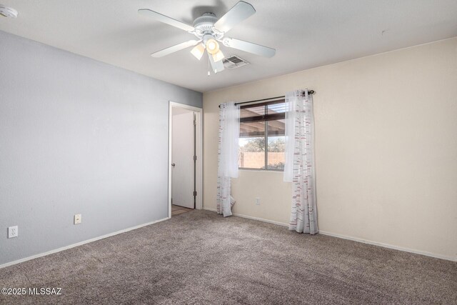 unfurnished room featuring carpet floors and ceiling fan