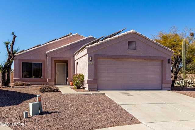 ranch-style home with a garage