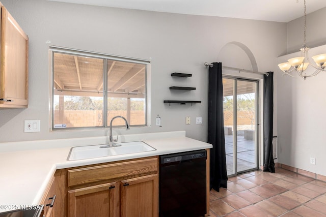 kitchen featuring pendant lighting, black dishwasher, sink, light tile patterned floors, and an inviting chandelier