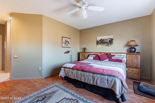 bedroom featuring light wood-type flooring and ceiling fan