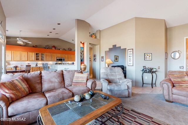 living room with lofted ceiling, light carpet, and ceiling fan