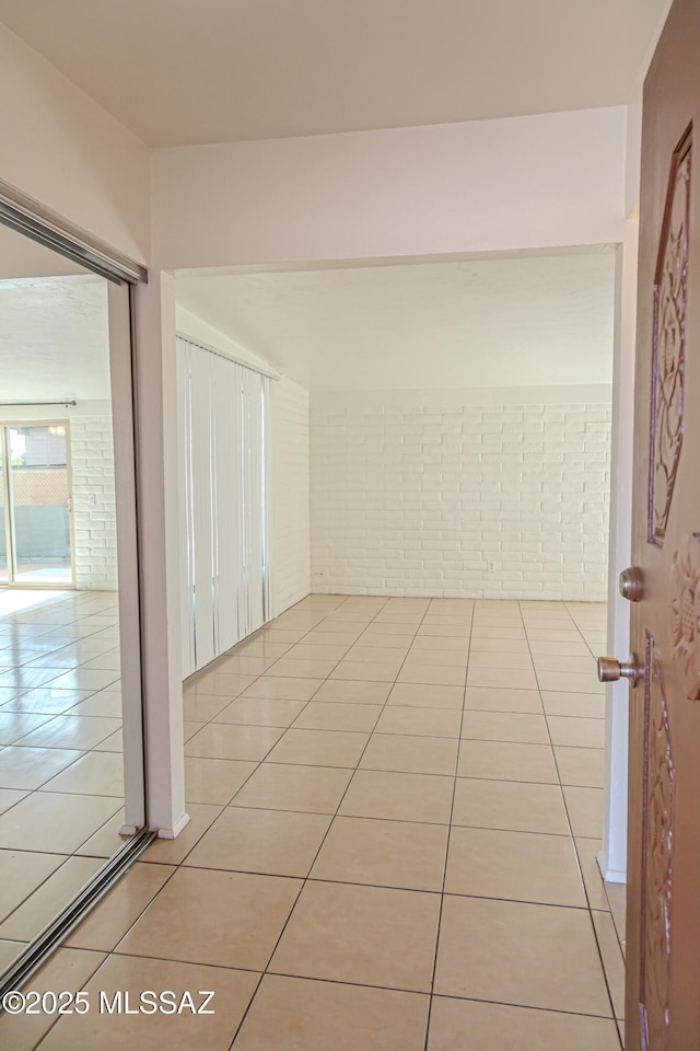 hallway featuring light tile patterned flooring