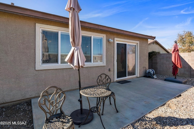 rear view of house with a patio area