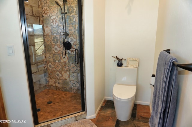 bathroom with walk in shower and toilet