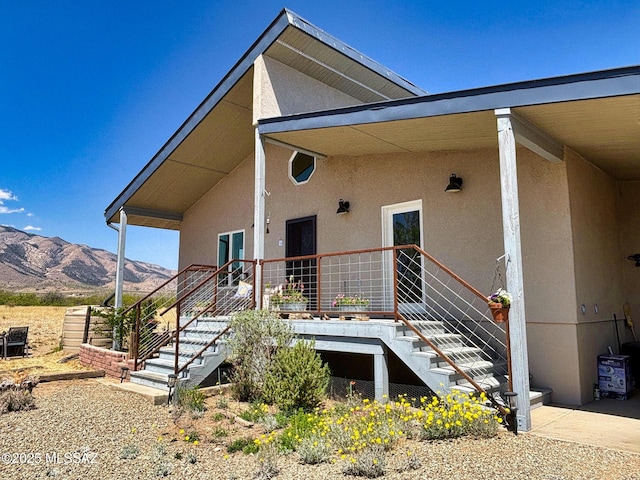 1155 N Dakotas Trl, Cochise, AZ 85606 - view of front of house with stucco siding, stairway, and a mountain view
