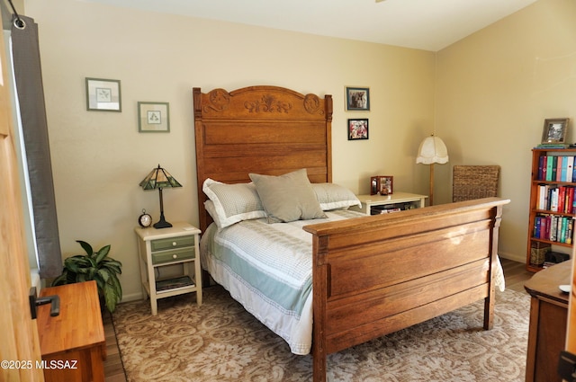 bedroom featuring hardwood / wood-style flooring