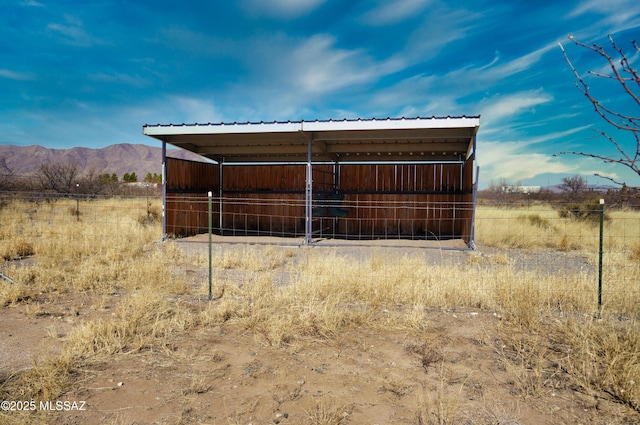 view of outdoor structure with a mountain view