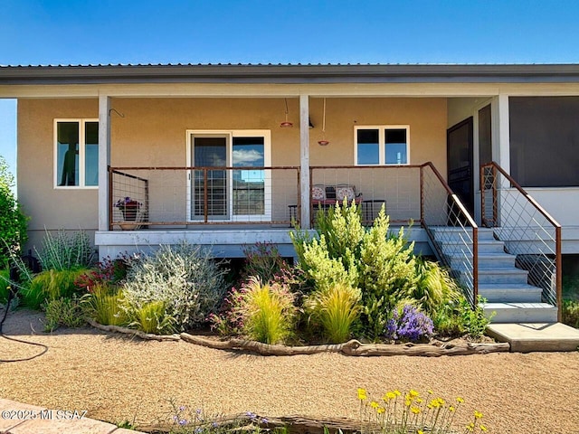 1155 N Dakotas Trl, Cochise, AZ 85606 - view of front of property with a porch and stucco siding