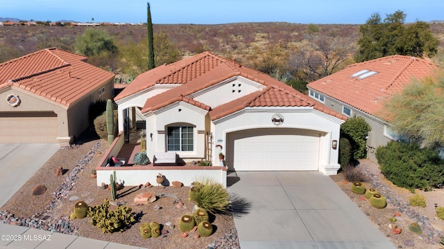 view of front of home with a garage