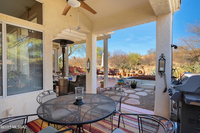 view of patio / terrace featuring ceiling fan