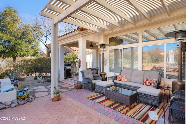 view of patio / terrace with a grill, an outdoor hangout area, and a pergola