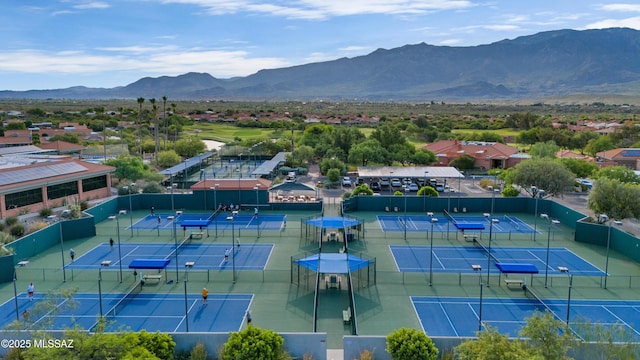 birds eye view of property featuring a mountain view