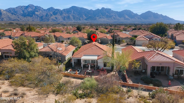 bird's eye view with a mountain view