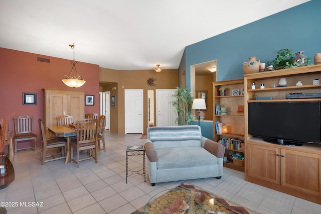 living room with light tile patterned flooring