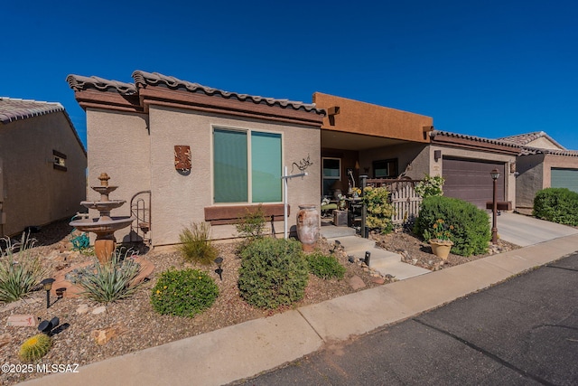 view of front of home with a garage