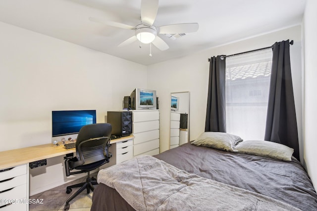 bedroom featuring a ceiling fan and visible vents