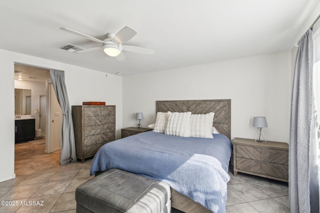 bedroom with visible vents, ceiling fan, and light tile patterned floors