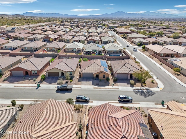 aerial view featuring a mountain view and a residential view