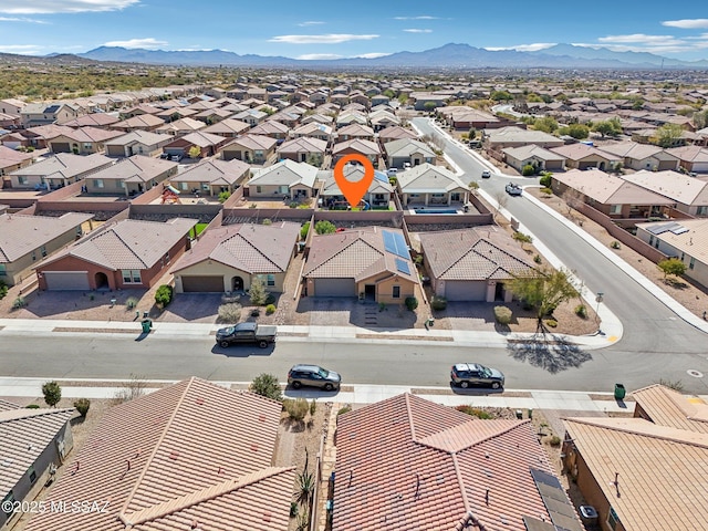 aerial view featuring a residential view and a mountain view