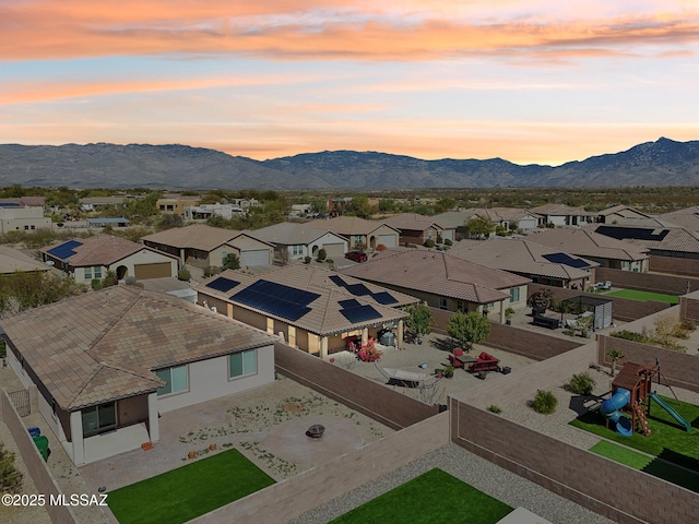 birds eye view of property featuring a residential view and a mountain view