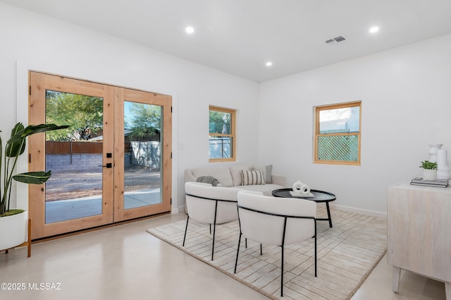 interior space featuring plenty of natural light and french doors