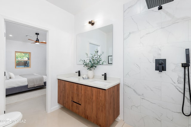 bathroom with ceiling fan, vanity, and toilet