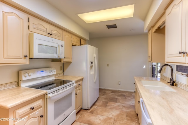 kitchen with sink and white appliances