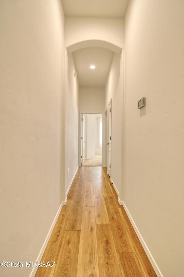 corridor featuring light wood-type flooring