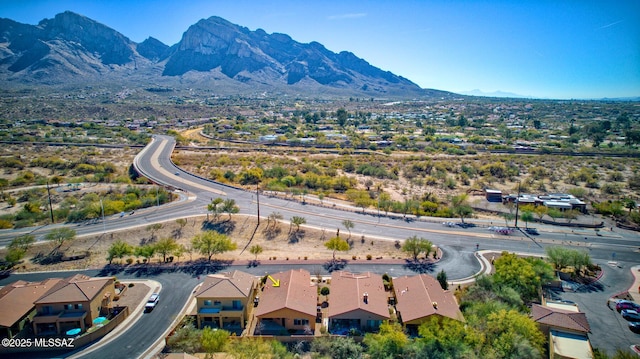 drone / aerial view featuring a mountain view