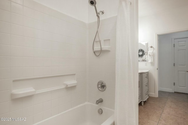 bathroom featuring tile patterned flooring and shower / bath combination with curtain