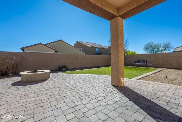 view of patio / terrace featuring a fire pit