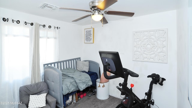 carpeted bedroom featuring ceiling fan