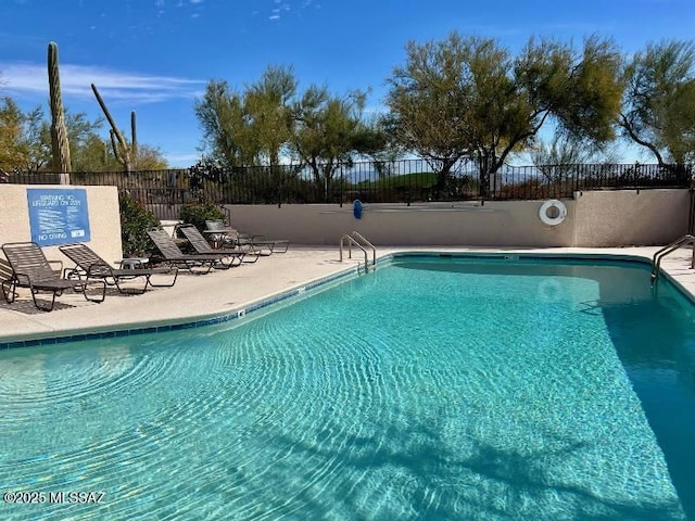 view of pool with a patio area