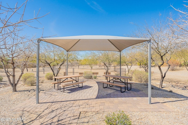 view of home's community with a patio