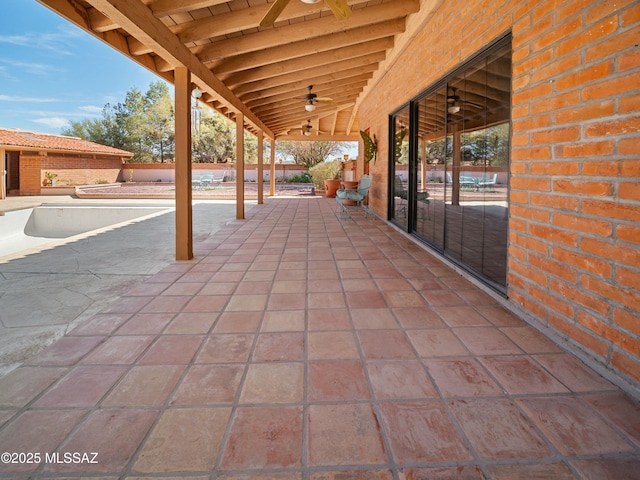 view of patio featuring ceiling fan and a fenced backyard