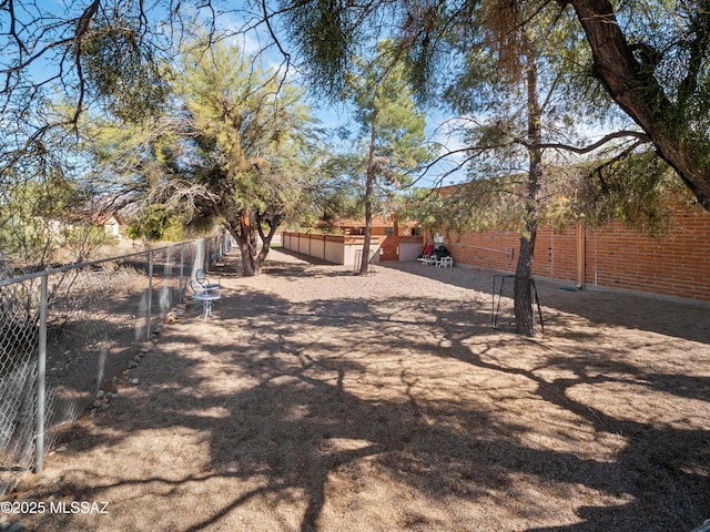 view of yard featuring fence