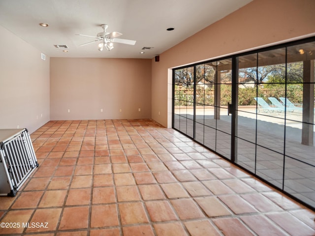 unfurnished room featuring light tile patterned floors, ceiling fan, visible vents, and recessed lighting