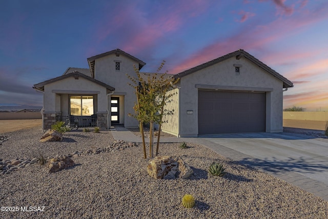 view of front of property featuring a garage