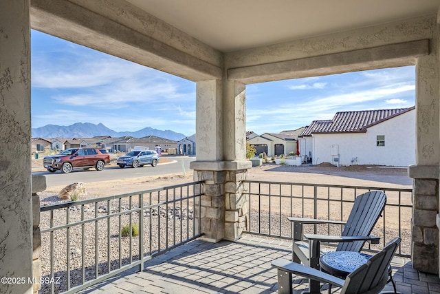 balcony featuring a mountain view