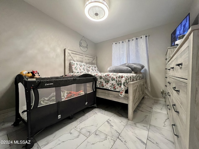 bedroom featuring vaulted ceiling