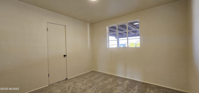 view of carpeted spare room