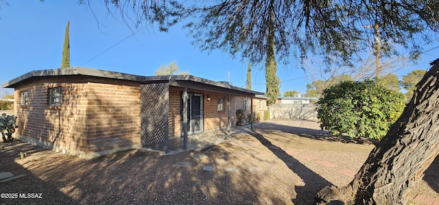 back of property with a patio area