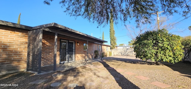 view of home's exterior with a patio