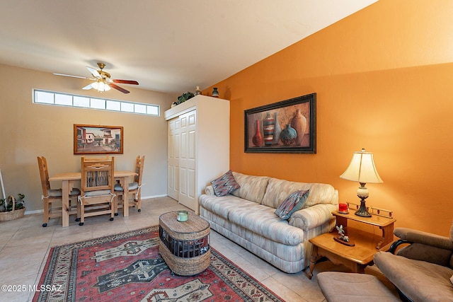 living room featuring light tile patterned floors and ceiling fan