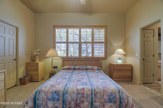 tiled bedroom with baseboards