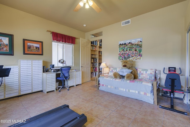 bedroom with tile patterned floors, a ceiling fan, and visible vents