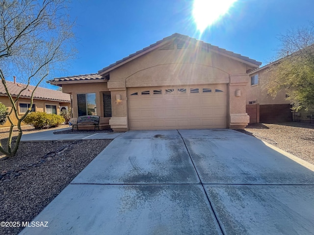 view of front of property featuring a garage